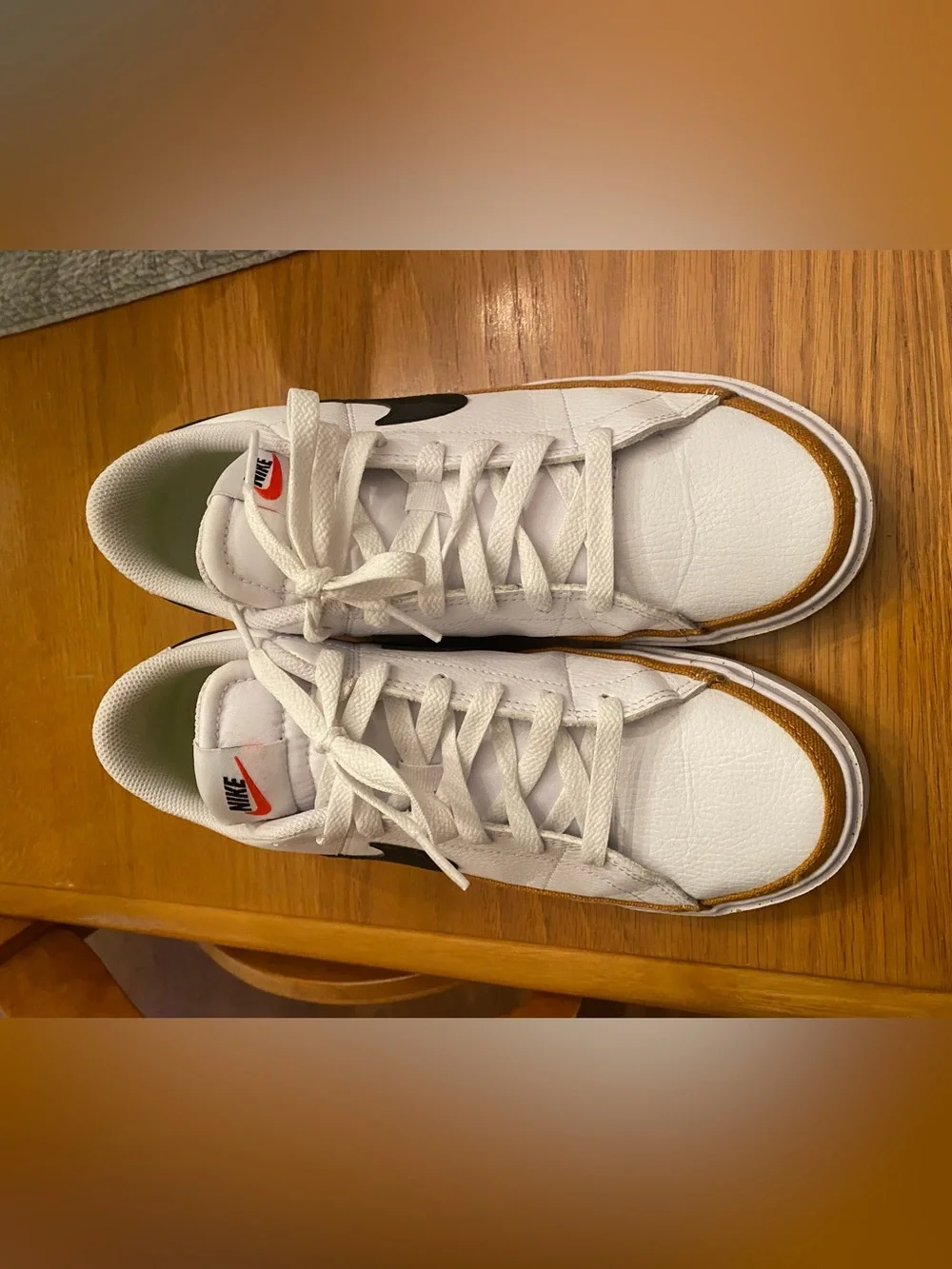 Nike Women’s  White Sneakers with Black Swoosh and Brown Trim